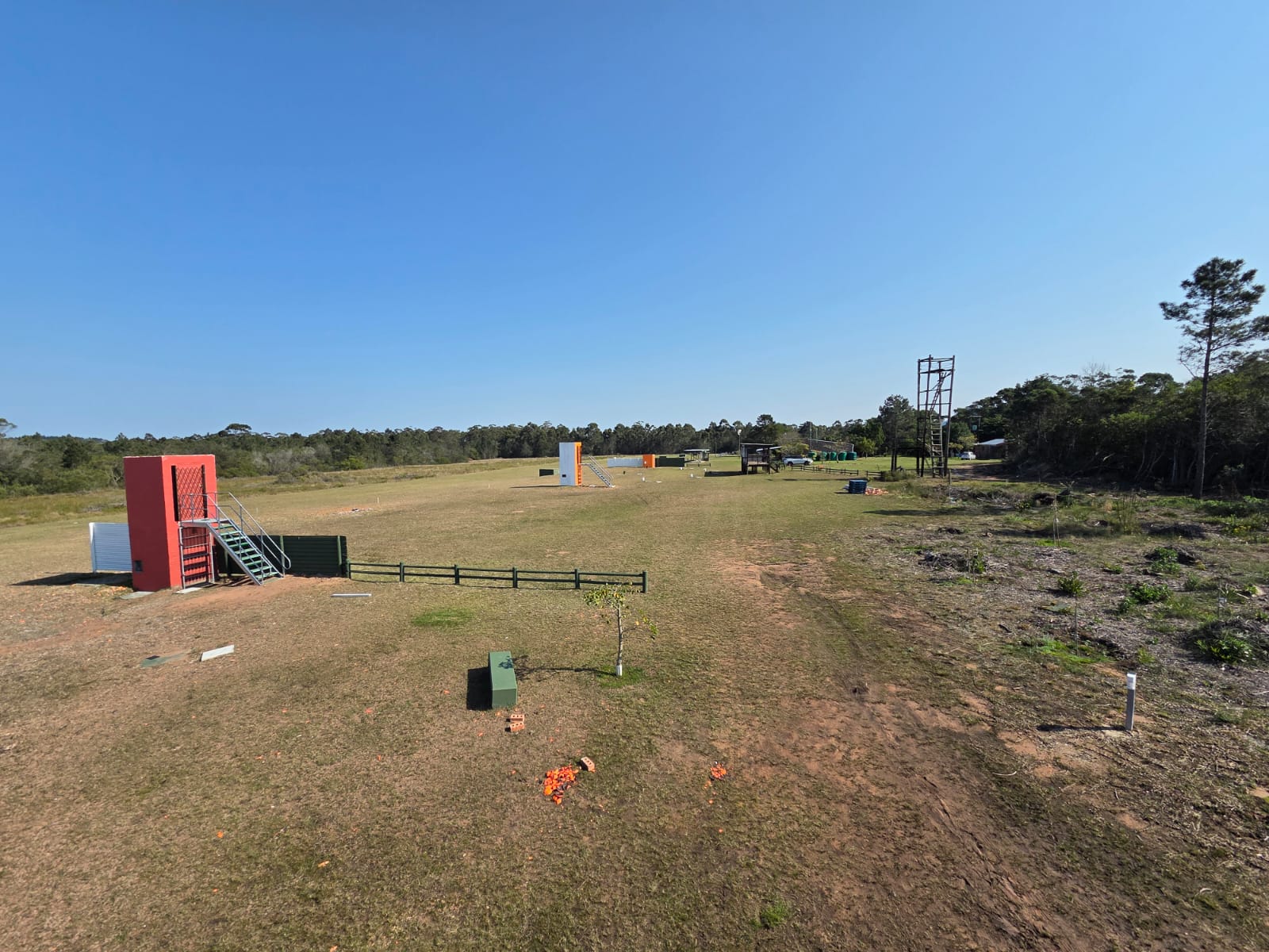 Wide view down the PECTC ranges with a red target tower in the foreground and the high tower beyond