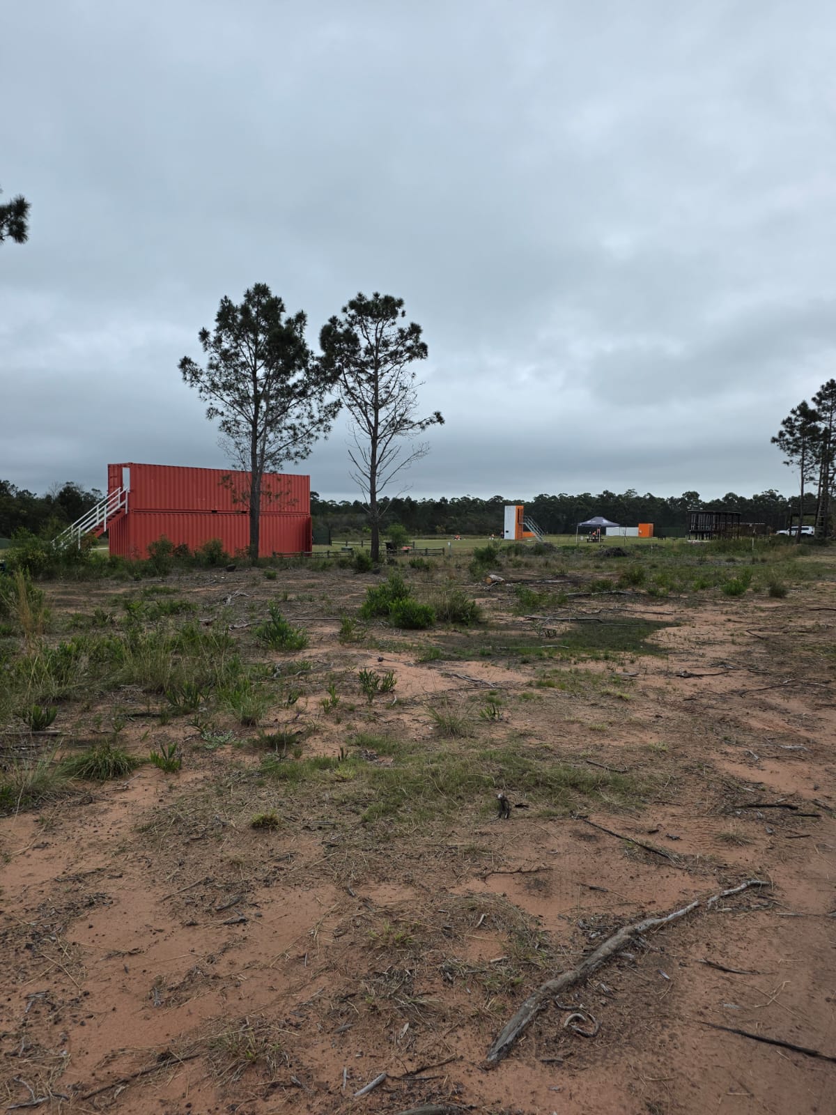 The red container shooting stand seen across open veld towards the PECTC ranges