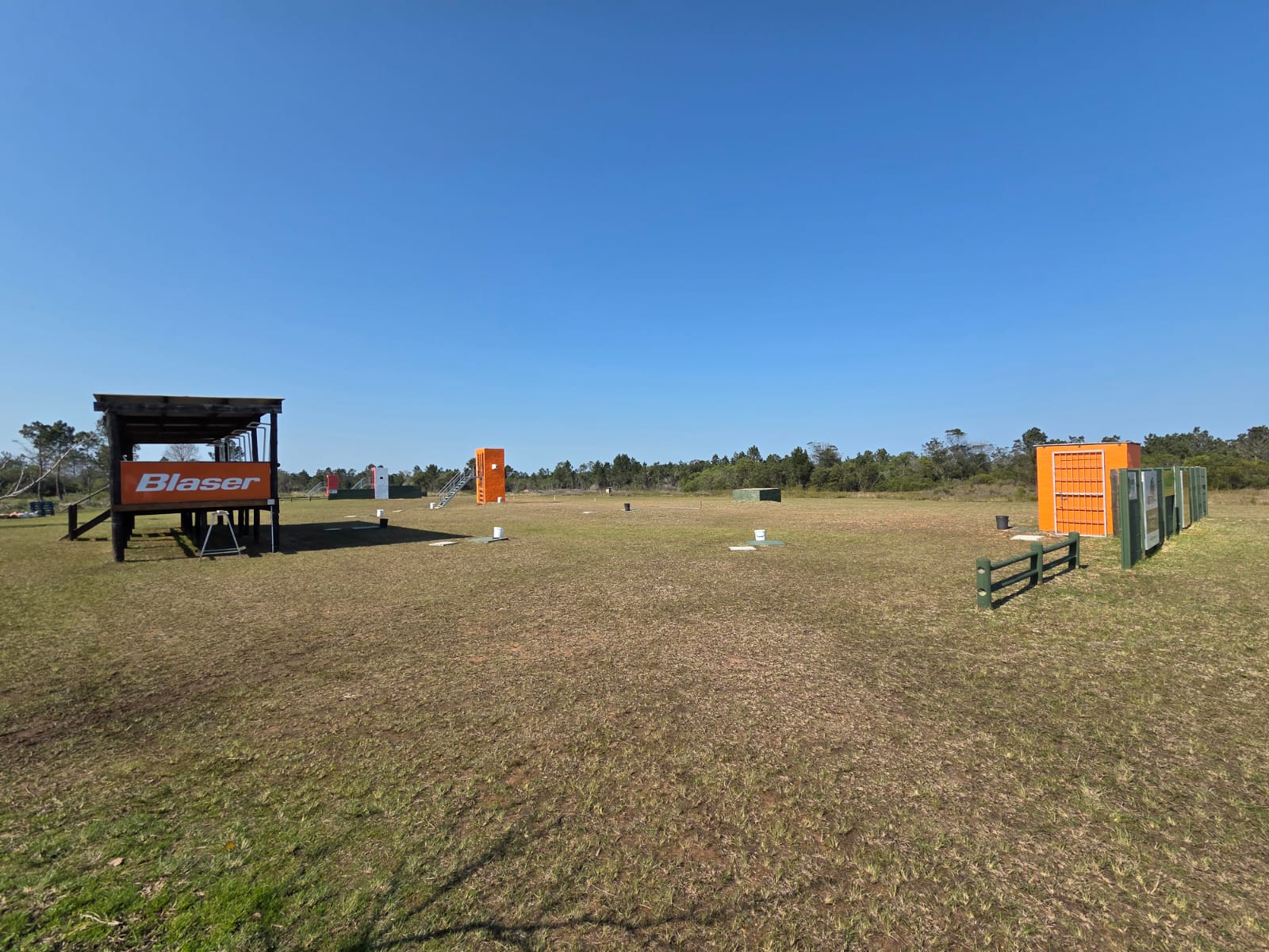 Wide view of the sporting layout at PECTC with the Blaser stand and orange target towers